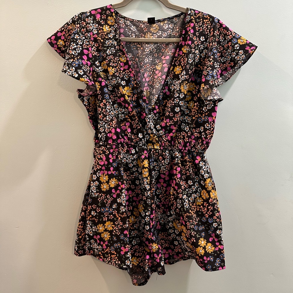 I LOVE this - super cute and floral! Very bright! Bought two by acccident